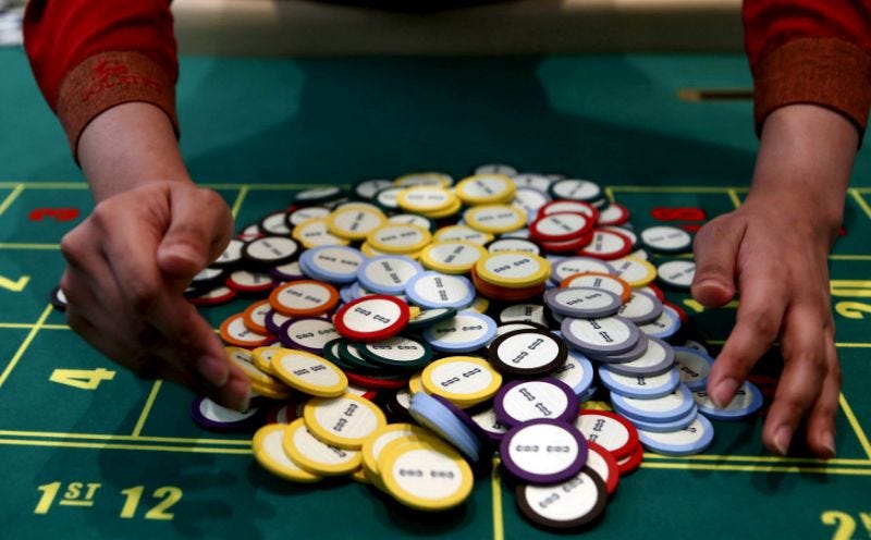 LES JEUX D'ARGENT À SINGAPOUR : CASINOS, MATCHS DE FOOTBALL TRUQUÉS ET JOUEURS CHINOIS À HAUT RENDEMENT INCOMPÉTENTS